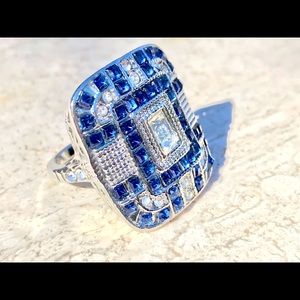 Fancy ring. Size shows 9-9 1/4. Large presence.